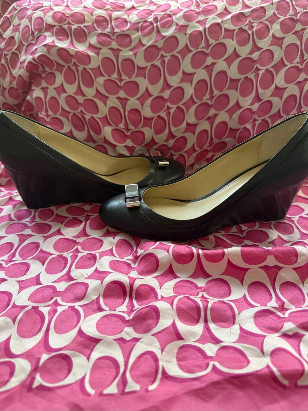 Beautiful  COACH Black Leather wedge shoes with Silver Bow Accent